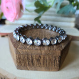 "Presto Posh" Black Metal & White/Clear Rhinestone Bangle Bracelet