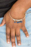 " All Roads Lead to Roam " Silver & Blue Beaded Charm Tension Bracelet