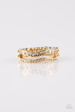 Paparazzi " Elite Squad " Gold & White/Clear Rhinestone Wavy Elastic Back Ring