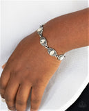 "Crown Privilege" Silver Metal & Clear/White Rhinestone "Evil Eye" Clasp Bracelet