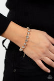 "A-Lister Afterglow" Gold Metal & White/Clear Round Rhinestone Clasp Bracelet