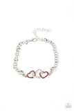 Paparazzi " Desirable Dazzle " Silver Metal Red Rhinestone Triple Heart Clasp Bracelet