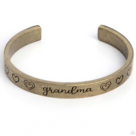 "A Grandmothers Love" Brass Metal with "Grandma" Surrounded by Hearts Cuff Bracelet