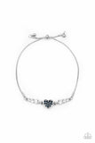 Paparazzi " Big Hearted Beam " Silver Blue Rhinestone Heart Bolo Slide Bracelet