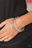 Paparazzi " Delicate Decadence " Silver Metal & Blue Rhinestone Bangle Bracelet Set of 5