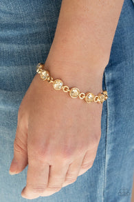 "First in Fashion Show" Gold Metal Iridescent Champaign Rhinestone Clasp Bracelet