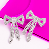 "Just BOW with it" Silver White/Clear Rhinestone Bow Earrings "LIFE OF THE PARTY" August 2023