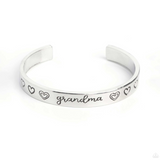 "A Grandmothers Love" Silver Metal with "Grandma" Surrounded by Hearts Cuff Bracelet