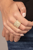 Paparazzi " Million Dollar  Maquerade " Gold White/Clear Rhinestone Elastic Back Ring