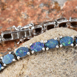 Platinum/Sterling Silver Premium Colors Boulder Opal Line Bracelet (7.50 in)