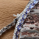 Platinum over Sterling Silver 7.2cts Tanzanite Oval Line Bracelet (6.50 in)