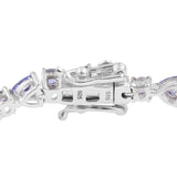 Platinum over Sterling Silver 7.8cts Tanzanite Trillion and Round Line Bracelet (8.00 in)