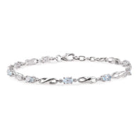 Platinum over Sterling Silver Sky Blue Topaz Bracelet Eternity Symbols