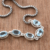 Sterling Silver Sky Blue TOPAZ Halo Adjustable Sliding Bolo Bracelet (3.80cts)