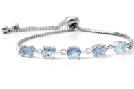 Sterling Silver Oval Sky Blue TOPAZ Adjustable Sliding Bolo Bracelet (2.60cts)