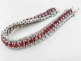 Rhodium over Sterling Silver Oval RUBY Line Tennis Bracelet (7 in)