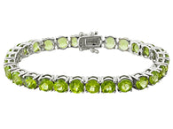 Rhodium/Sterling Silver 27cts. Vibrant Green PERIDOT Tennis Bracelet (Size 7.25")