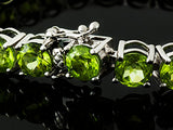 Rhodium/Sterling Silver 27cts. Vibrant Green PERIDOT Tennis Bracelet (Size 7.25")