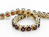 18k Yellow Gold over Sterling Silver 12cts. Mozambique GARNET Line Tennis Bracelet (7 in)